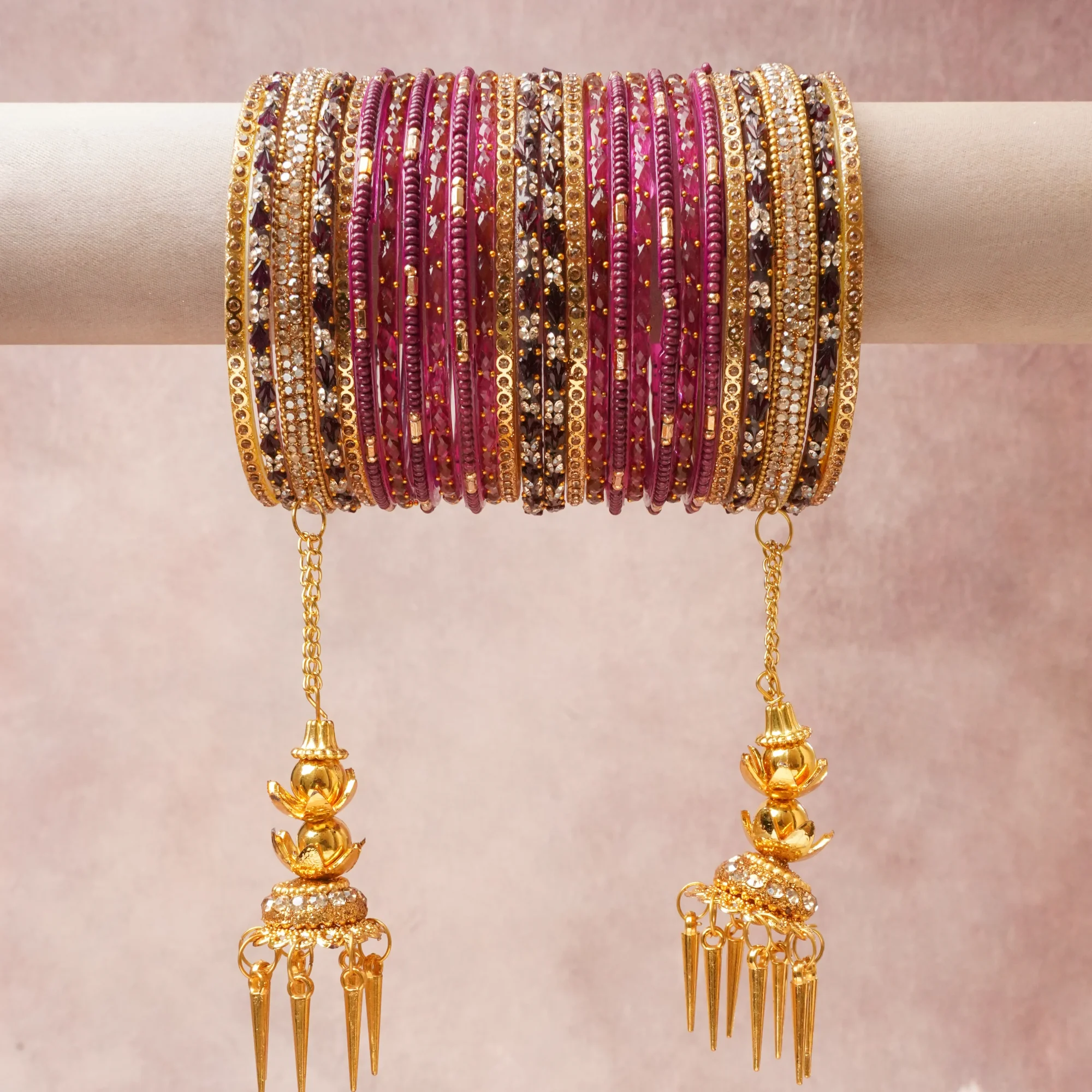 A commanding Deep Plum anchors this beautiful set, enriched with accents of Rich Gold, Jet Black, Brilliant White that add depth and dimension.

Featuring a striking composition of Gold-Toned Metal Alloy, Lacquered Resin, Glass, Cubic Zirconia, this set carries intricate craftsmanship and strong presence. Grand in form, it is created for moments that deserve to be marked.